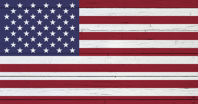 Flag of the United States of America on wooden background