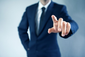 Businessman pressing an imaginary button