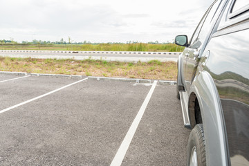 Empty parking lot and car