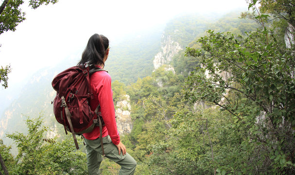 young wonan hiker enjoy the view on mountain