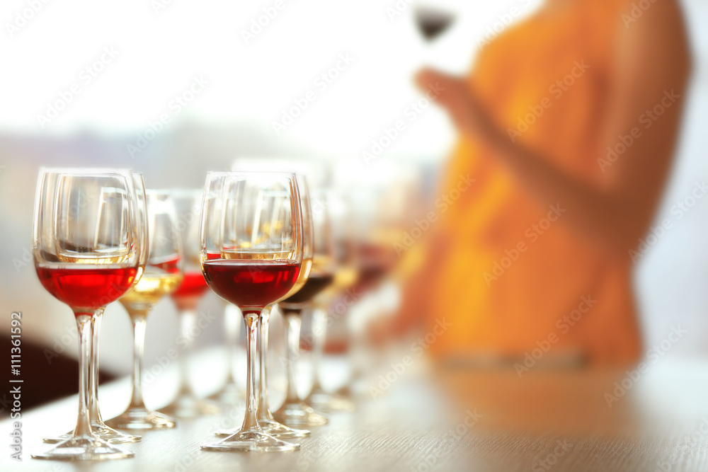 Canvas Prints many glasses of different wine in a row on a table. tasting wine concept