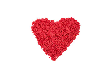 Obraz na płótnie Canvas red heart shape made from rice