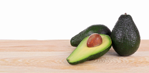 Fresh avocados on a white background