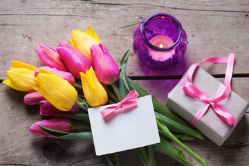 Postcard with flowers, tag and present in box