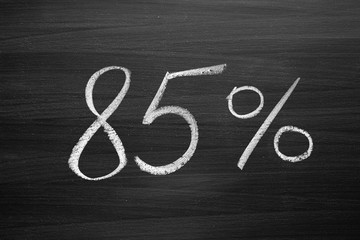 85 percent header written with a chalk on the blackboard