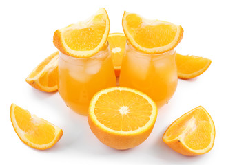 Iced orange drink with fresh pieces isolated on white