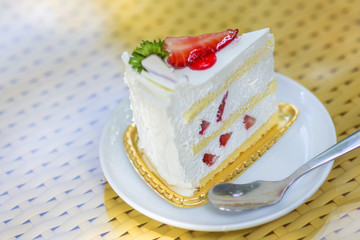 Butter cake and red strawberry.