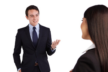 Young Caucasian business man smiling happily to a business woman
