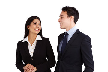 Young Caucasian business man is smiling at a business woman