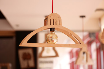 Wooden lamp on ceiling, closeup
