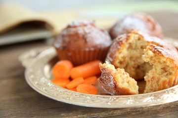 Carrot muffins  on a golden plate