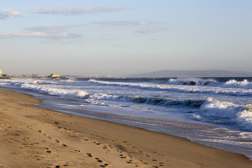 Amusement Park on the Pacific ocean, the beach landscape. The ocean, beach and blue sky in USA, Santa Monica. 