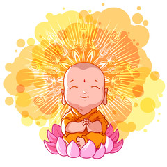 Little meditating monk on the lotus. Sunny day.