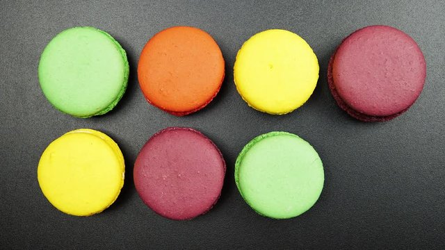 Rows of a colorful macaroons (stop-motion)