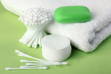Obraz na płótnie Canvas personal hygiene products on green background