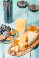 assorted cheese and vine