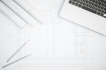 Desktop with architectural plan top