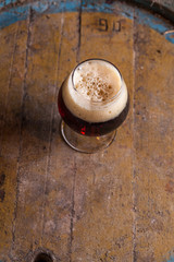 Dark beer in a cellar