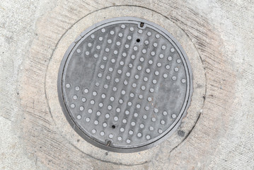 Rusty, grunge manhole cover