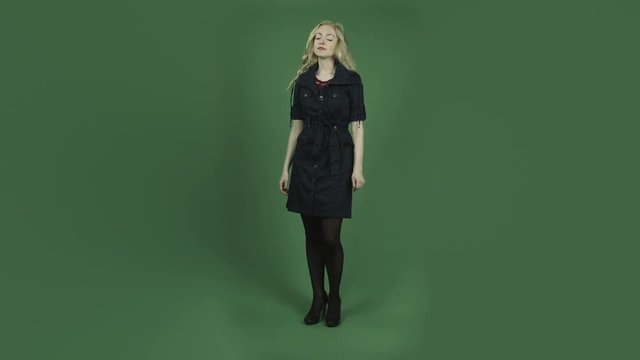 caucasian woman in blue dress isolated on chroma green screen background upset anger