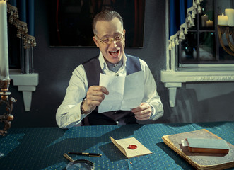 Man reading a letter