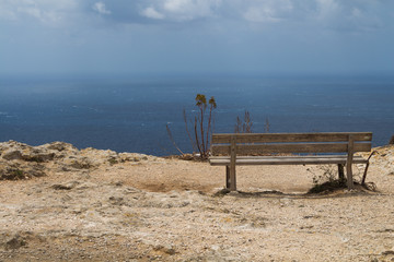 Fototapeta na wymiar Empty bench with a sea view, Malta
