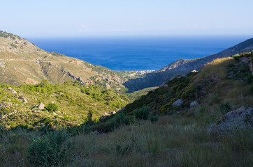 Fototapeta na wymiar Mountains over the sea on Crete island, Greece