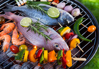 Barbecue grill with sea fishes.