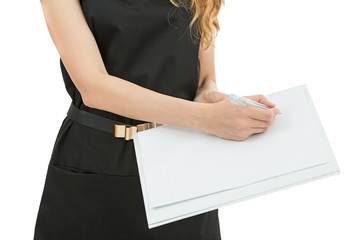 Business woman showing a contract with a pen to sign