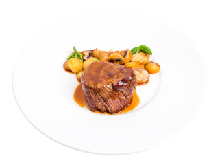 Delicious beef steak in demiglas sauce.