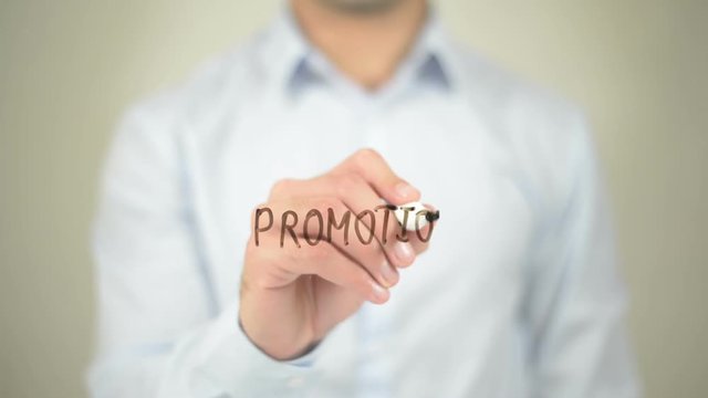 Promotion,  Man writing on transparent screen