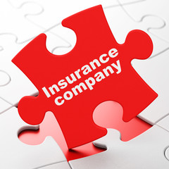 Insurance concept: Insurance Company on puzzle background