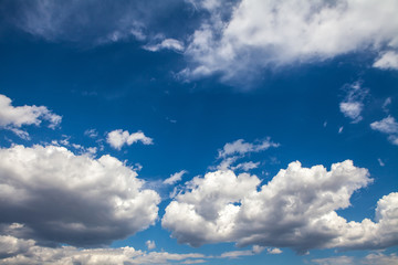 white clouds in the blue sky. background