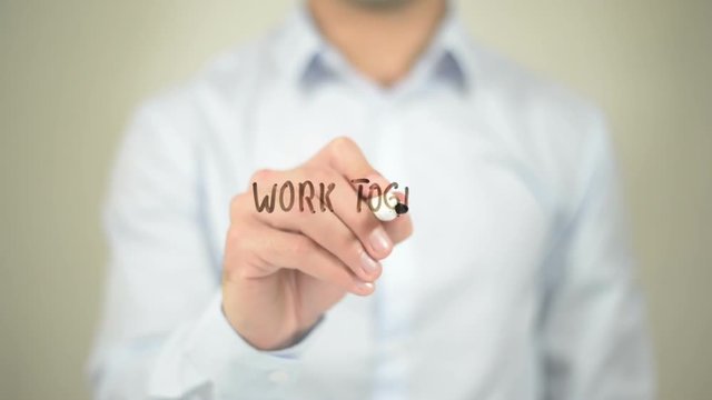 Work Together,  Man writing on transparent screen