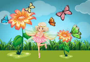 Fairy and butterflies in the garden