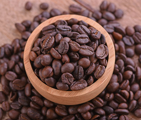 Coffee beans in a cup Wood