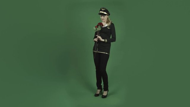 caucasian air hostess isolated on chroma green screen background romance love rose
