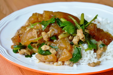 stir fried pork skin with Chinese celery on plain rice