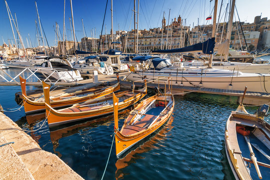 Traditional sailboats in the port of Valletta, Malta.