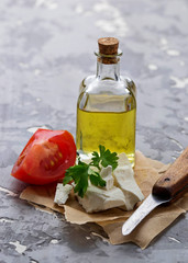 Obraz premium Feta cheese with tomato and oil.