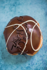  chocolate glazed artisan donut, overhead