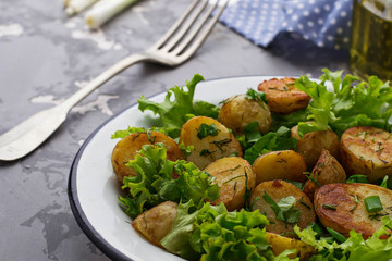 Salad with potato, parsley, dill and lettuce