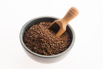 Linseeds on white background