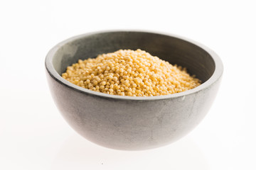 millet groats on white