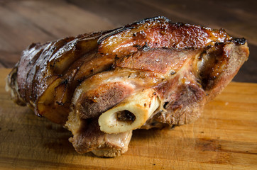 Roasted pork knuckle on the wood