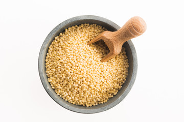 millet groats on white