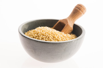 millet groats on white