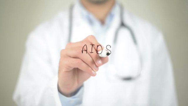AIDS, Doctor writing on transparent screen