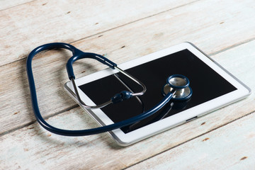 Medical tablet with screen as copy space.