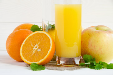glass of orange juice with fruits